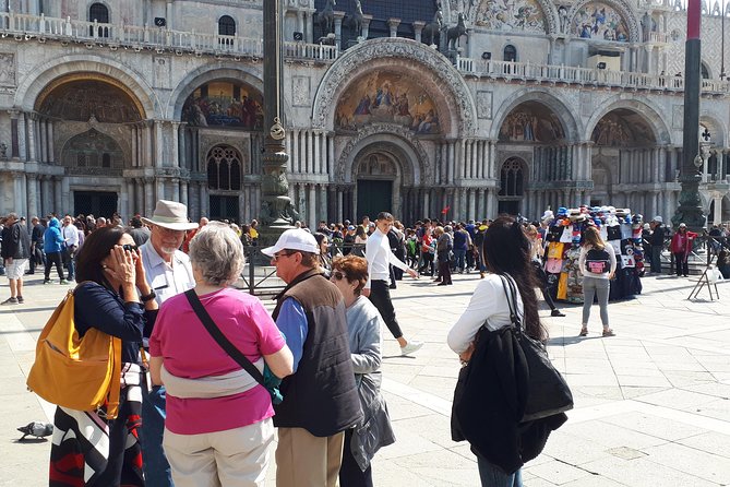 From Milan: Venice Full-Day Guided Tour With Boat Ride - Venetian Lagoon return: Tronchetto boat ride and the end-of-day shift
