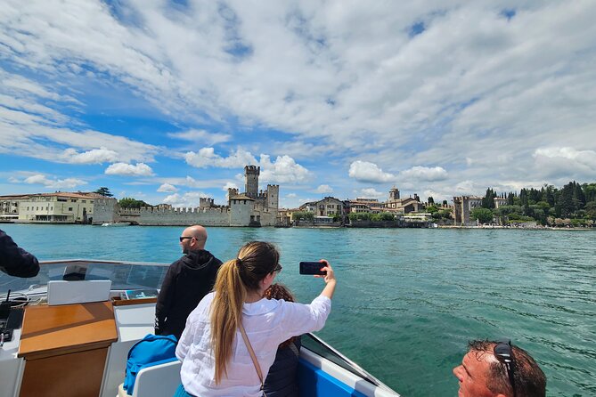 From Milan: Verona, Sirmione and Lake Garda Tour with Boat Cruise - Lake Garda by Private Boat: When the Weather Plays Along