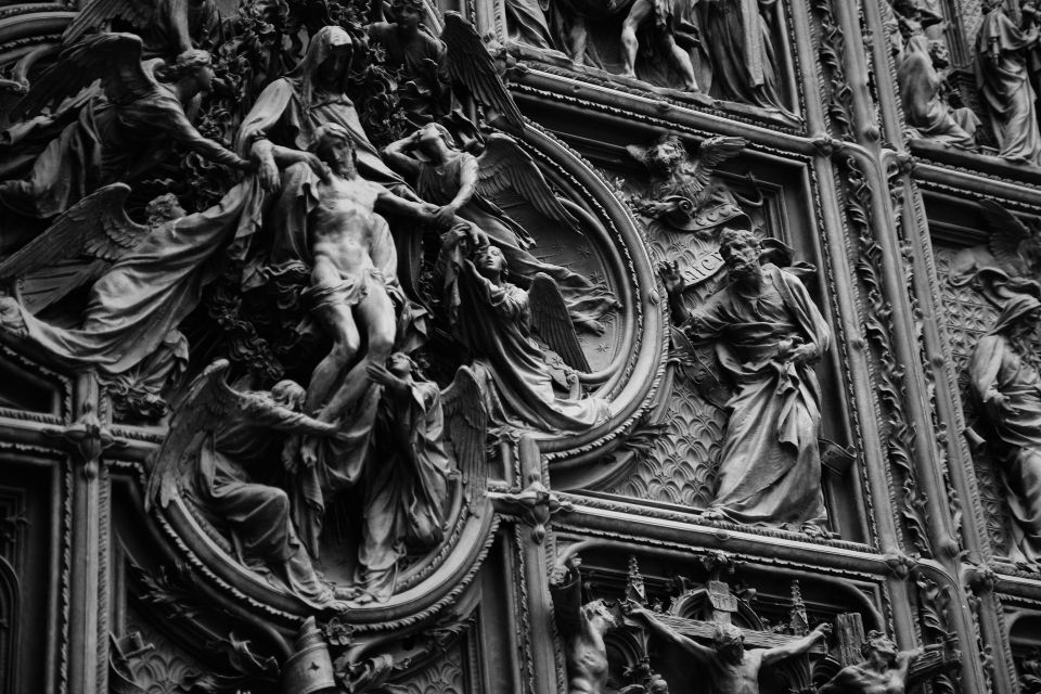 Milan: Cathedral and Terraces Guided Experience - Photo stop: getting skyline views that feel like Milan