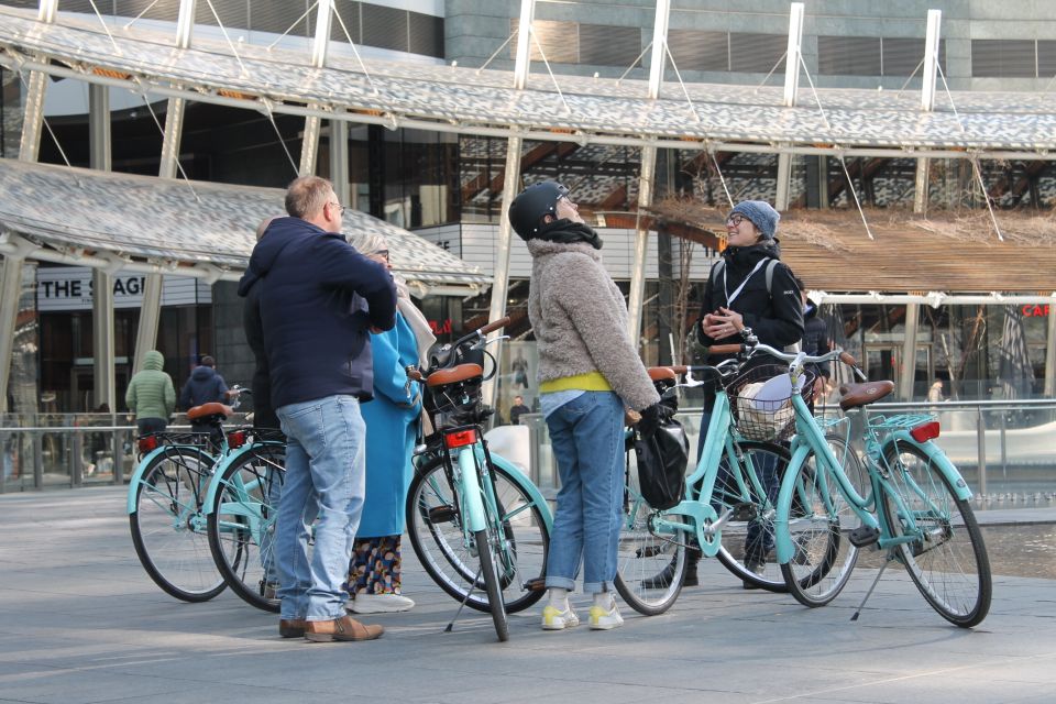 Milan: Highlights and Hidden Gems Guided Bike Tour - Biking Milan the Easy Way: Aquamarine Bikes, Helmets, and Flat-Street Confidence