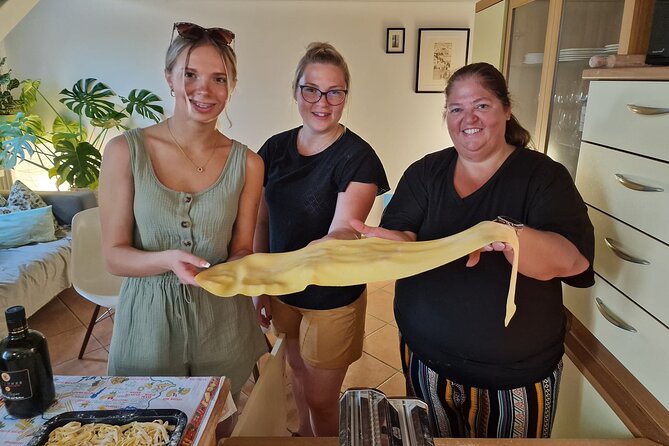 Milan: Pasta, Tiramisu, Cooking Class! Learning Premium Products! - Eating what you made: family-style dinner and kitchen stories
