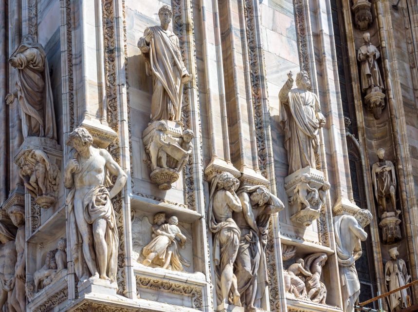 Milan: Skip-the-Line Duomo Guided Tour & Hop-on Hop-off Bus - The Details Your Guide Makes Meaningful: Stained Glass and Marble Statues