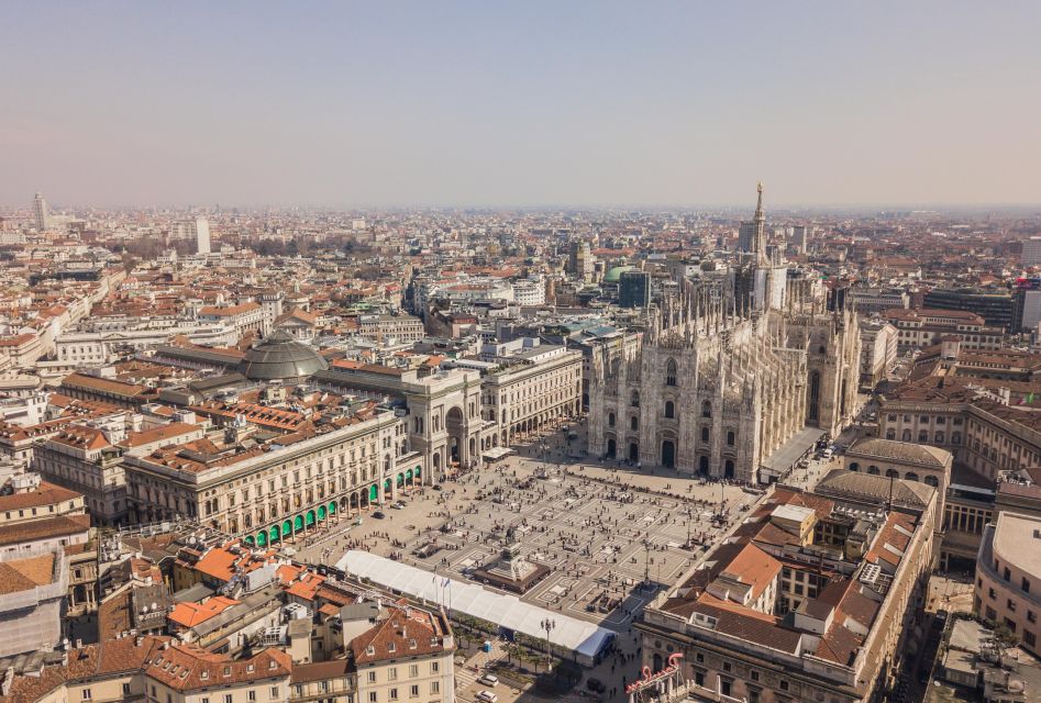 Milan Small Group: Duomo & Rooftop, Castle, Gelato Tasting - Milan in walking mode: Galleria, La Scala outside, and street-level context