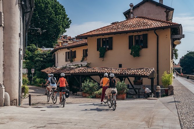 Small-group Milan Highlights e-Bike Tour - Piazza Affari and L.O.V.E.: Art, Money, and a Quick Jolt of Modern Humor